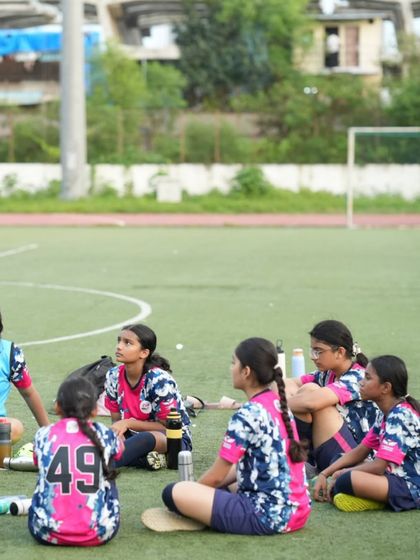 A moment of reflection and strategy as our U16 girls listen to a team talk during a break at the SIS Powerplay tournament.