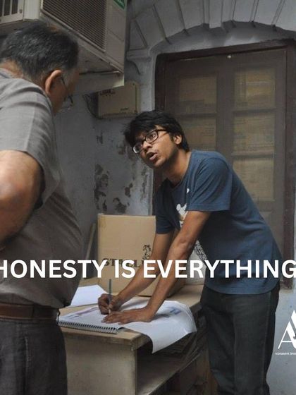 Honesty is everything. A throwback to our Studio Manager's early days, passionately discussing plans on-site. This dedication has been a cornerstone of our practice.