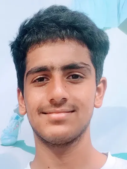 A portrait of Prateek Sheoran, who advanced to the Semifinals of the Fenesta Open Boys U-16 category after a thrilling three-set victory.