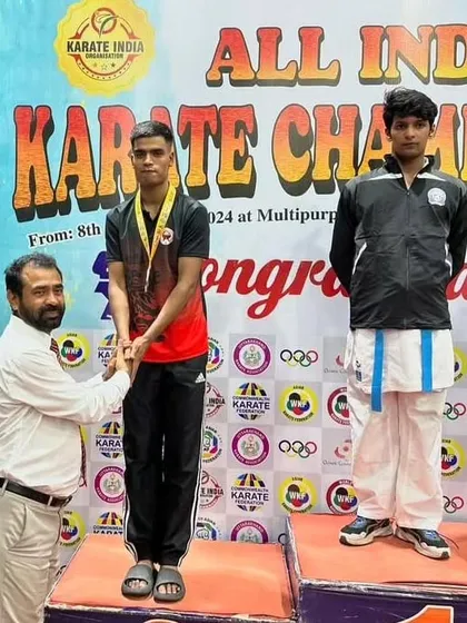 Harshit Pandey receiving his medal at the All India Karate Championship in Dehradun.