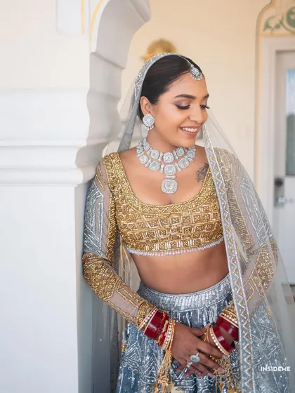 For the modern bride who dreams in metallics. Mishi's gold and silver lehenga was a statement, so we created a makeup look to match. Her skin is luminous, her eyes are softly defined, and the whole look feels contemporary yet timelessly bridal.
