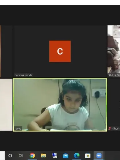 A candid screenshot of an online class in progress. I ensure every student gets the attention they need to thrive, even in a virtual setting.