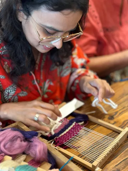 Here is a participant completely absorbed in her work, finding a quiet focus as she weaves. My workshops are all about this feeling of mindful creation, where the process is just as important as the finished piece. No experience is needed, just a willingness to try.