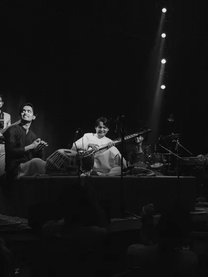A candid moment of laughter and music on stage with my band at The Piano Man. My performances are not just about the music, but also about connecting with the audience through light banter and shared joy.