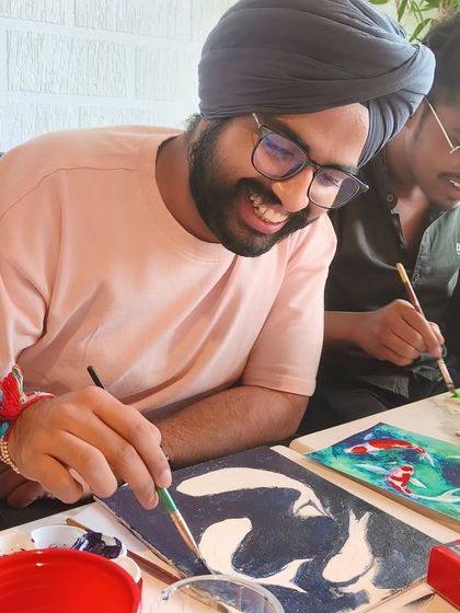 That smile says it all! Creating art should be fun, and I love it when the whole room is filled with laughter and good energy.