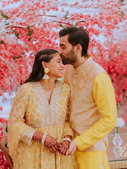 A sweet forehead kiss, a gesture of love and protection. These are the quiet, heartfelt moments that truly define a wedding day.
