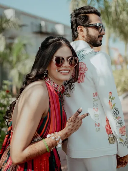 The bride giving a playful peace sign. We love capturing the fun and quirky side of our couples' personalities during their pre-wedding shoots.
