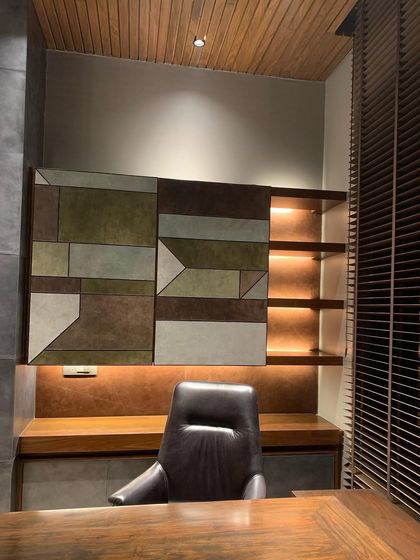 A close-up of the custom storage unit in the T House study, with its integrated lighting highlighting the shelves.