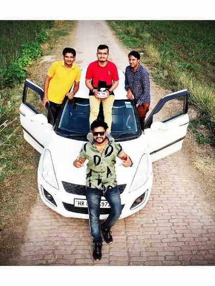 This is a great example of a creative group portrait taken from a bird's eye view. It's a fantastic option for friends, families, or teams who want a photo that is anything but ordinary.