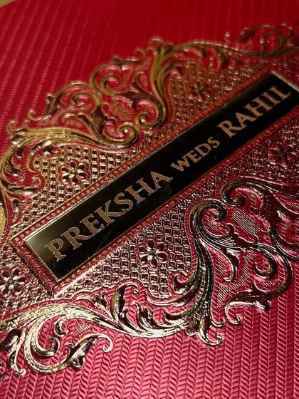 A detailed shot of the intricate gold metalwork on the nameplate, showcasing the quality and craftsmanship of the design.