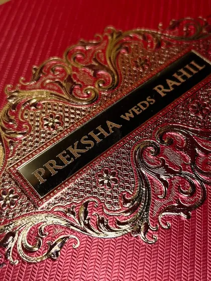A detailed shot of the intricate gold metalwork on the nameplate, showcasing the quality and craftsmanship of the design.