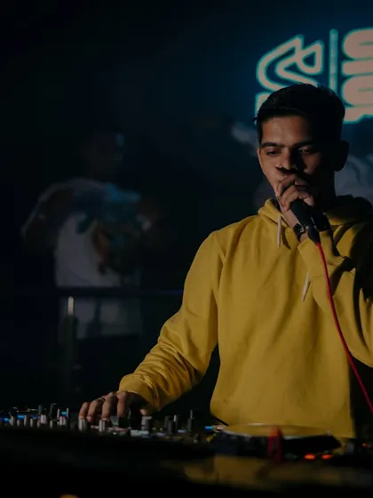 On the mic at Fingerprint, connecting with the crowd and guiding the energy of the room.