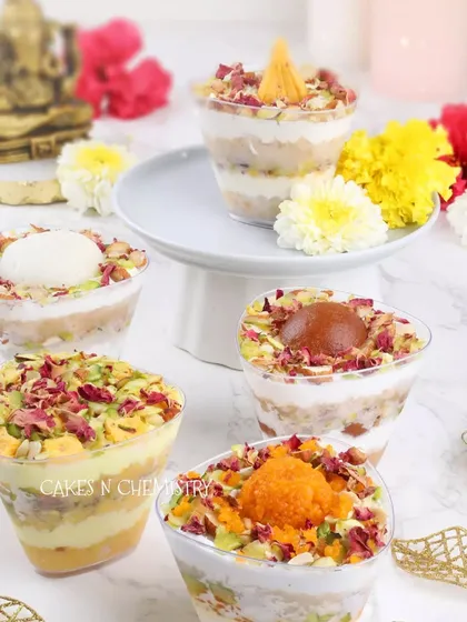 My Indian fusion dessert jars are always a crowd-pleaser. Here you can see a variety of my most-loved flavors: Rasmalai, Gulab Jamun, Motichoor, Rasgulla, and Kesar Peda. They are perfect for festive celebrations or as a unique dessert option for any party.