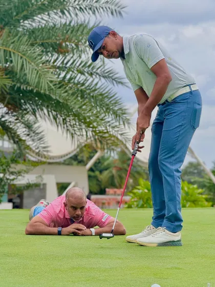 Coaching is about seeing what others don't. Sometimes, that means getting a different perspective. I am committed to doing whatever it takes to help my players understand the nuances of the game, even if it means getting on the ground to analyze a putt.