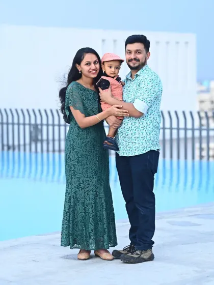 A beautiful family portrait by the pool during Derick's first birthday celebration. We help you capture these precious family moments.