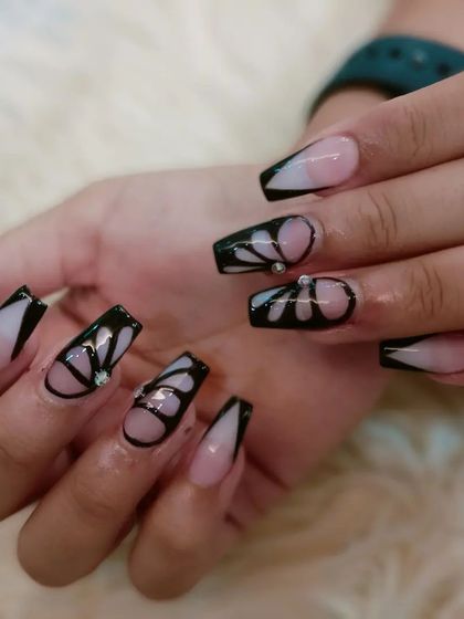 A clear shot of the butterfly wing art, showing the delicate lines.