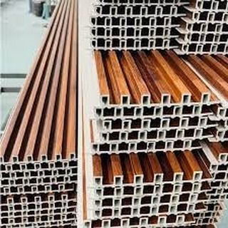 Stacks of our WPC louvers ready for dispatch. This shows the profile of the panels and how they are constructed for easy installation.