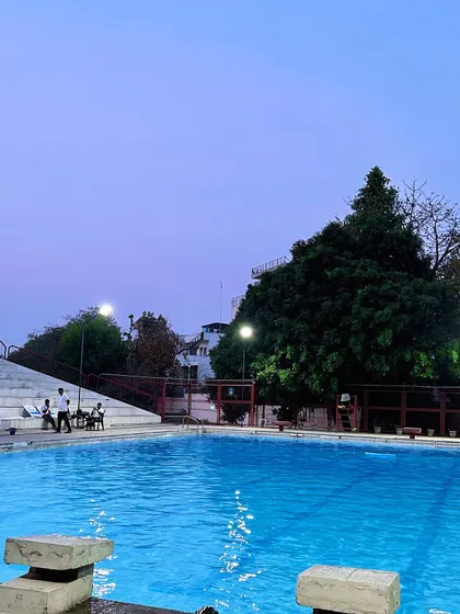 The calm and serene atmosphere at our pool as evening sets in. It is the perfect setting to leave the day's stress behind and enjoy your time in the water.