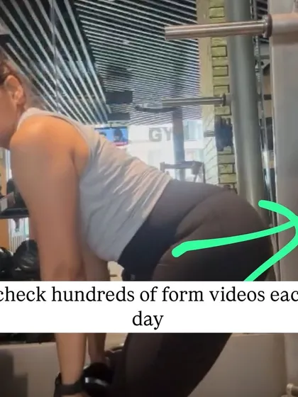 A photo showing me reviewing a client's form video. I check hundreds of these each day to ensure my clients are executing movements correctly and safely.
