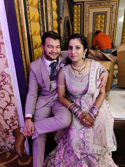 A lovely couple at their wedding function. For her, I created a soft glam look with a hint of shimmer on the eyes and a neutral pink lip that looked beautiful both in person and for the photographs.