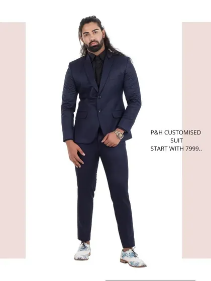 A full-length shot of the navy blue suit, a perfect choice for business or formal events.