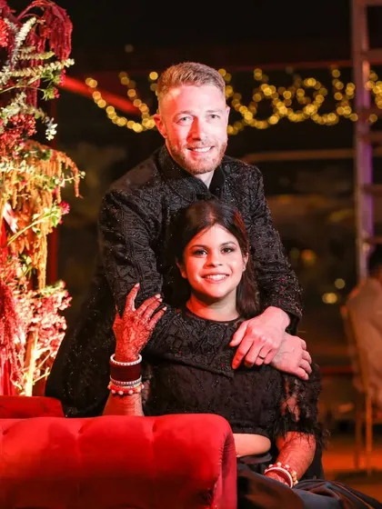 We believe a reception should feel like a galaxy of joy. For this night, we draped the sky in rich red fabric and a constellation of fairy lights, creating a warm, vibrant space where guests could share laughter and make memories under the stars.