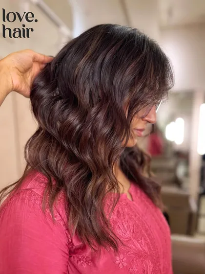 This week's flavor is chocolate chip cookie dough. A delicious mix of brown and light tones creates this stunning brunette balayage.