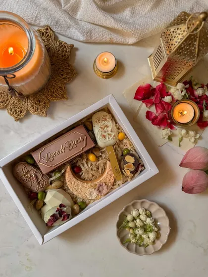 Another view of the assorted Eid gift box, showing how the different textures and shapes of the treats come together to create a beautiful hamper.