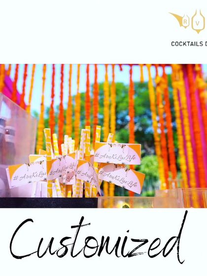 We make sure even the smallest details are on-brand for your event. These custom stirrers were designed with the couple's wedding hashtag, #AruKiLavLife, for a fun touch at their Haldi party.