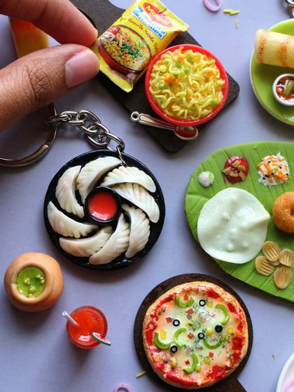 A collection of my most popular miniatures, including Maggi, momos, pizza, and a South Indian meal.