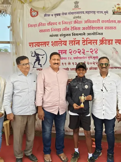 Rishikesh Mane with officials after the state-level selection tournament for the Maharashtra team.