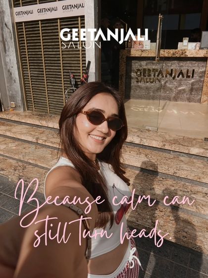 Because calm can still turn heads. A client's selfie outside the salon, radiating confidence and happiness with her new look.