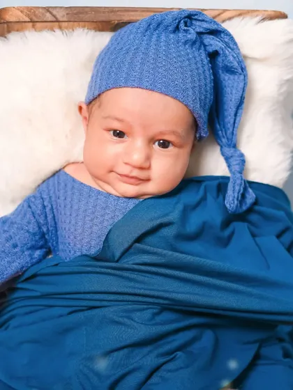A sweet, sleepy smile from a newborn baby boy. I patiently wait for these fleeting expressions that you will treasure for a lifetime.
