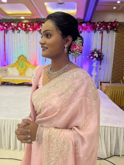 Another view of the hairstyle and the diamond jewellery, which perfectly complements the soft glam makeup.