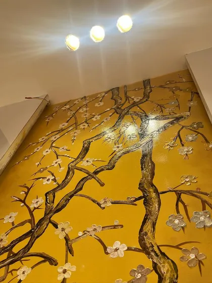 A low-angle shot showing the texture and shine of the yellow background.