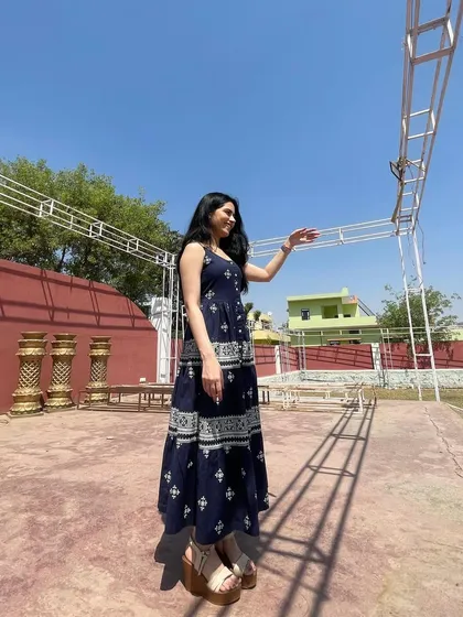 A poet enjoying the sunny campus of BITS Pilani before the evening performance. These trips are a great bonding experience for our team.