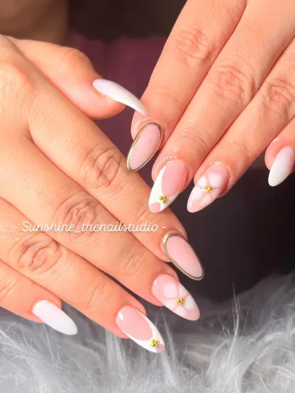 Another look at the milky white and gold chrome French manicure.