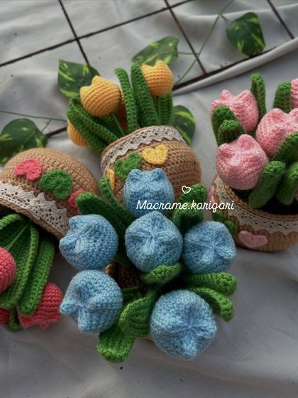 A colorful assortment of our handmade tulip pots, showcasing the variety of hues available. These are perfect for bulk orders and return gifts.