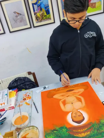 A series documenting a student's creation of a Jain spiritual painting, showing the careful application of color and detail.