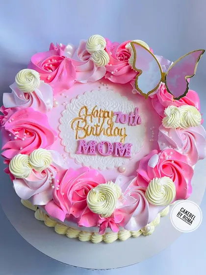 A beautiful pink floral cake for a mom's 70th birthday.