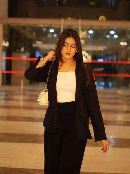 Looking down, this pose is chic and understated.