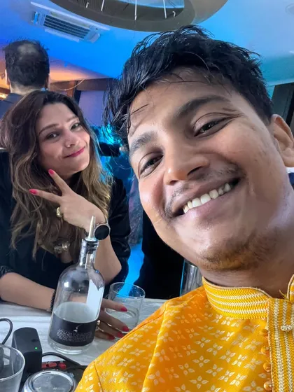 A selfie with a happy guest at a Diwali house party. Connecting with clients and their friends is what makes these events so enjoyable.