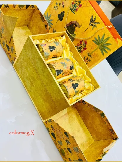 For moments as grand as a wedding, we present our bespoke hampers. This stunning yellow hamper, featuring intricate traditional prints and filled with gourmet selections, is designed to be a memorable part of your celebration.