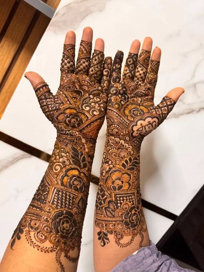 A clear, top-down view of a full bridal henna design. This shows the level of detail and symmetry I bring to my work.