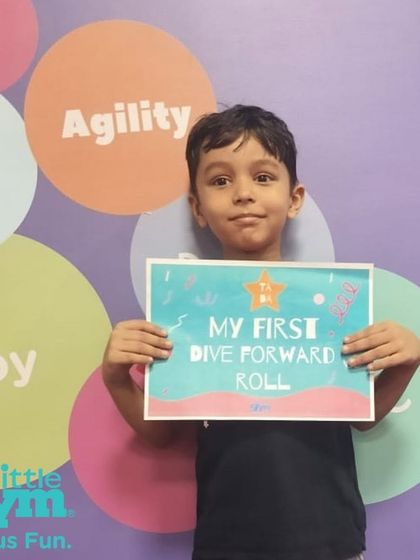 Another milestone achieved. This young champion just completed his first dive forward roll, a skill that requires courage and body control. We celebrate every step of his gymnastics journey.