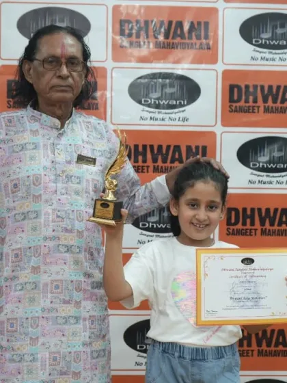 A senior guru with another one of our young, talented award winners.