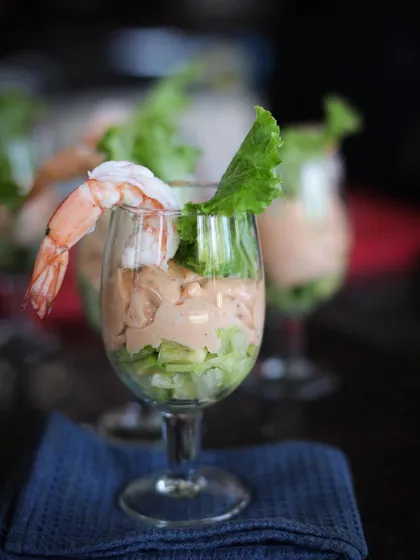 A beautifully presented prawn cocktail, a classic dish that teaches the art of simple elegance.