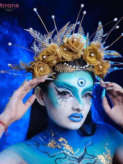 This angle highlights the three-dimensional aspect of the headpiece and the careful placement of each pearl and gold leaf.