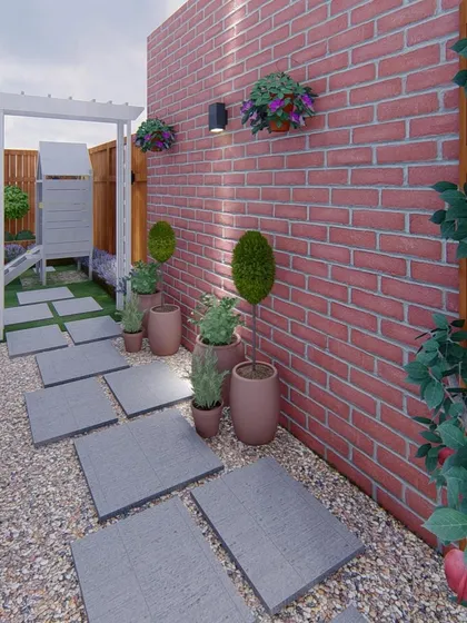 This view shows the stone pathway we designed, which is perfect for kids to walk on. The mix of textures like stone, gravel, and grass makes the garden more interesting for little explorers.