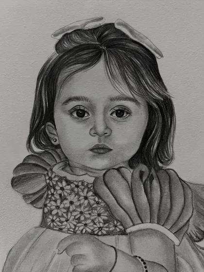A closer view of the little girl's portrait, highlighting the detail in her floral dress and the soft bow in her hair.